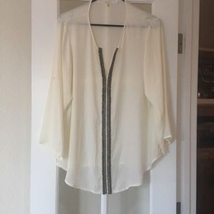 Cream blouse with silver beading